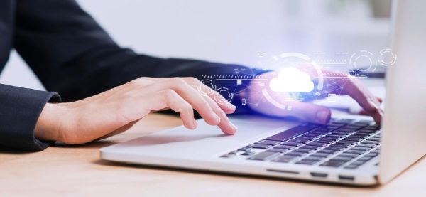 A person uses a laptop